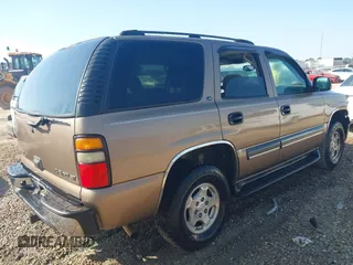 2004 Chevrolet Tahoe LT z VIN 1GNEC13Z04R130978, wystawiony jako IAAI lot #42073871 z przebiegiem 214 947 mil mil oraz . Historia ofert i sprzedaży dostępna na DreamBid. Obrazek 4.