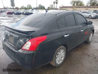 2019 Nissan Versa Sedan SV with VIN 3N1CN7AP6KL802709, listed as a IAAI auction lot 41818338 with 127,358 mi miles. Bid and sale history available at carsss.com. Image 4.
