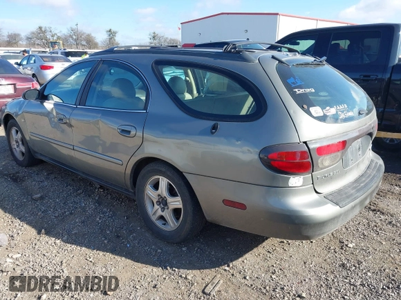 2002 Ford Taurus z VIN 1FAHP59SX2G137396, wystawiony jako IAAI lot #41661425 z przebiegiem 155 789 mil mil oraz . Historia ofert i sprzedaży dostępna na DreamBid. Obrazek 3.