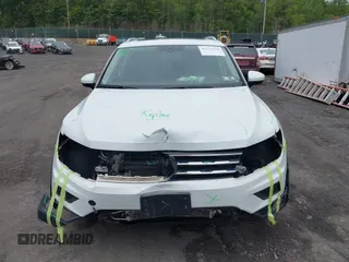 2018 Volkswagen Tiguan SEL with VIN 3VV2B7AX7JM099570, listed as a IAAI auction lot 42374274 with 87,838 mi miles and . Bid and sale history available at DreamBid. Image 12.