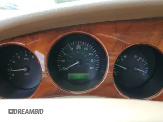 1999 Jaguar XK z VIN SAJGX2044XC031383, wystawiony jako Copart lot #54726925 z przebiegiem 107 696 mil mil oraz Szkody całkowita. Historia ofert i sprzedaży dostępna na DreamBid. Obrazek 9.