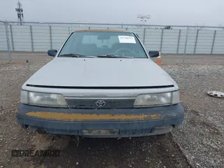 1990 Toyota Camry DLX z VIN 4T1SV21EXLU271320, wystawiony jako IAAI lot #41798353 z przebiegiem 269 178 mil mil oraz . Historia ofert i sprzedaży dostępna na DreamBid. Obrazek 6.