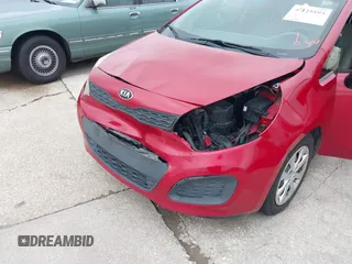 2015 Kia Rio LX with VIN KNADM5A34F6517123, listed as a IAAI auction lot 42125593 with 138,214 mi miles. Bid and sale history available at carsss.com. Image 6.