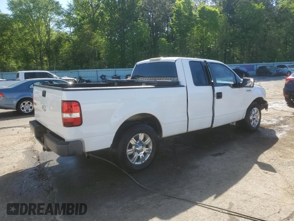 2007 Ford F-150 STX with VIN 1FTRX12W37NA05703, listed as a Copart auction lot 51927885 with 206,593 mi miles and Salvage Title. Bid and sale history available at DreamBid. Image 3.