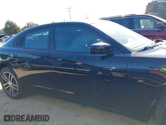 2019 Dodge Charger SXT with VIN 2C3CDXJG4KH710673, listed as a IAAI auction lot 41469797 with 102,011 mi miles and . Bid and sale history available at DreamBid. Image 14.