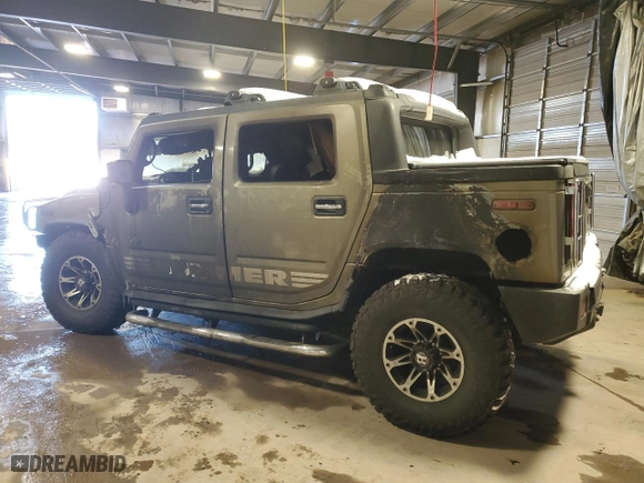 2005 Hummer H2 SUT with VIN 5GRGN22U35H125903, listed as a Copart auction lot 88751345 with 0 mi miles and Salvage Title. Bid and sale history available at carsss.com. Image 2.