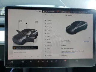2023 Tesla Model Y Long Range z VIN 7SAYGAEE9PF662103, wystawiony jako Copart lot #51332105 z przebiegiem 35 294 mil mil oraz Szkody całkowita. Historia ofert i sprzedaży dostępna na DreamBid. Obrazek 9.
