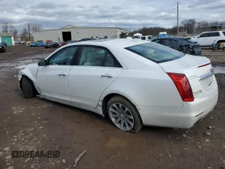2016 Cadillac CTS Luxury Collection AWD with VIN 1G6AX5SX6G0121426, listed as a Copart auction lot 49540985 with 65,858 mi miles and Salvage Title. Bid and sale history available at DreamBid. Image 2.