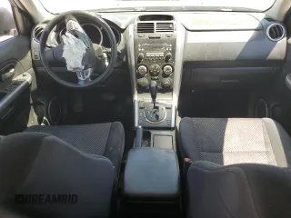 2006 Suzuki Grand Vitara Premium with VIN JS3TD943964102832, listed as a Copart auction lot 59971694 with 148,329 mi miles and Salvage title. Bid and sale history available at DreamBid. Image 8.