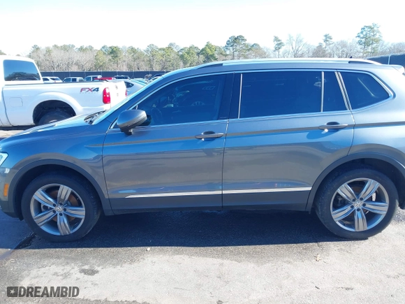 2021 Volkswagen Tiguan SE with VIN 3VV2B7AX2MM001713, listed as a IAAI auction lot 41357396 with 81,872 mi miles. Bid and sale history available at carsss.com. Image 14.