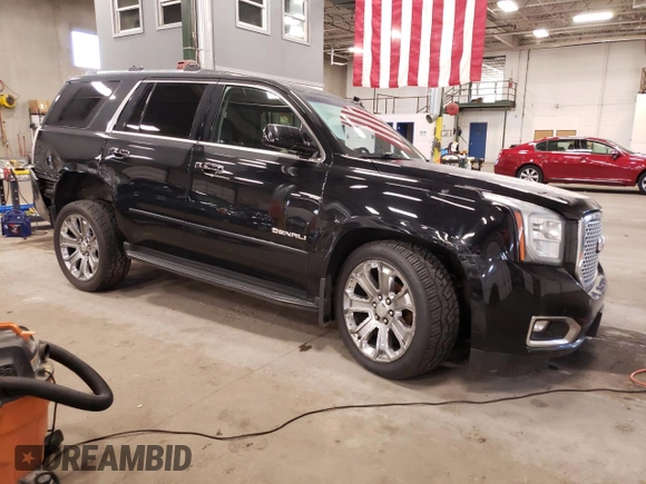 2016 GMC Yukon Denali with VIN 1GKS2CKJ8GR402482, listed as a Copart auction lot 69753434 with 160,816 mi miles and Salvage Title. Bid and sale history available at carsss.com. Image 4.