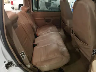 2000 Ford Explorer Eddie Bauer z VIN 1FMDU84P0YZC67167, wystawiony jako Copart lot #85806684 z przebiegiem 156 411 mil mil oraz Szkoda całkowita • Salvage title. Historia ofert i sprzedaży dostępna na DreamBid. Obrazek 11.