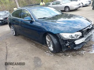 2016 BMW 4 Series 428i xDrive z VIN WBA4C9C54GG141317, wystawiony jako IAAI lot #42043052 z przebiegiem 142 274 mil mil oraz . Historia ofert i sprzedaży dostępna na DreamBid. Obrazek 1.
