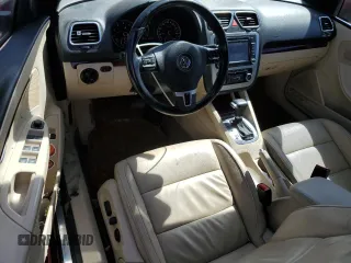 2011 Volkswagen Eos Lux с VIN WVWFA7AH5BV002336, выставлен на аукционе Copart как лот 55287125 с пробегом 95 124 миль миль и Списание • Salvage title. История ставок и продаж доступна на DreamBid. Изображение 8.