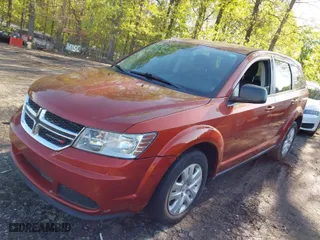 2014 Dodge Journey SE with VIN 3C4PDCAB9ET245801, listed as a IAAI auction lot 41982250 with 119,468 mi miles. Bid and sale history available at carsss.com. Image 2.