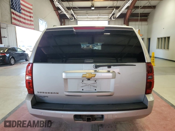 2014 Chevrolet Suburban LT with VIN 1GNSKJE77ER120211, listed as a Copart auction lot 62469424 with 213,282 mi miles and Salvage Title. Bid and sale history available at carsss.com. Image 6.