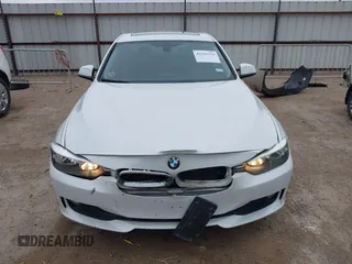 2015 BMW 3 Series 320i with VIN WBA3B1C5XFK140734, listed as a IAAI auction lot 42141319 with 84,863 mi miles and . Bid and sale history available at DreamBid. Image 12.
