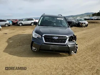 2018 Subaru Forester Touring with VIN JF2SJGWC0JH492548, listed as a Copart auction lot 49763305 with 74,382 mi miles and Salvage Title. Bid and sale history available at carsss.com. Image 12.
