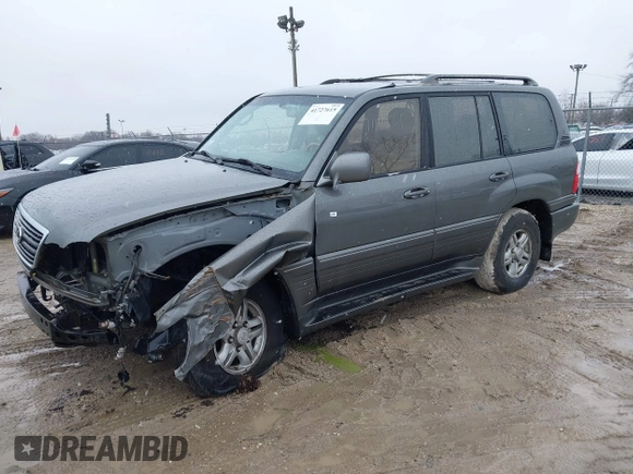 2000 Lexus LX 470 z VIN JT6HT00W8Y0092556, wystawiony jako IAAI lot #41727615 z przebiegiem 156 262 mil mil oraz . Historia ofert i sprzedaży dostępna na DreamBid. Obrazek 2.