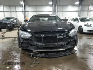2017 Maserati Ghibli S Q4 z VIN ZAM57RTA0H1196498, wystawiony jako Copart lot #79911364 z przebiegiem 69 950 mil mil oraz Szkody całkowita. Historia ofert i sprzedaży dostępna na DreamBid. Obrazek 5.