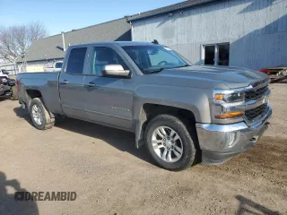 2017 Chevrolet Silverado 1500 LT with VIN 1GCVKREH0HZ166156, listed as a Copart auction lot 52137055 with 161,481 mi miles and Clean Title. Bid and sale history available at DreamBid. Image 4.