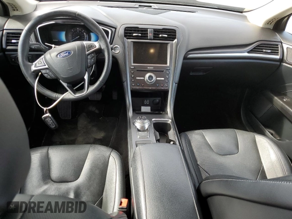 2019 Ford Fusion Hybrid Titanium with VIN 3FA6P0RU0KR144636, listed as a Copart auction lot 44357323 with 100,146 mi miles. Bid and sale history available at carsss.com. Image 8.