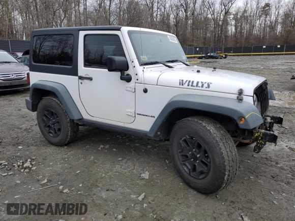 2015 Jeep Wrangler Sport with VIN 1C4AJWAG1FL525429, listed as a Copart auction lot 43033025 with 93,972 mi miles and Salvage title. Bid and sale history available at DreamBid. Image 4.