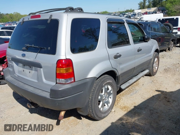 2003 Ford Escape XLT Popular 2 with VIN 1FMYU93183KD62338, listed as a IAAI auction lot 41990799 with 216,952 mi miles and . Bid and sale history available at DreamBid. Image 4.