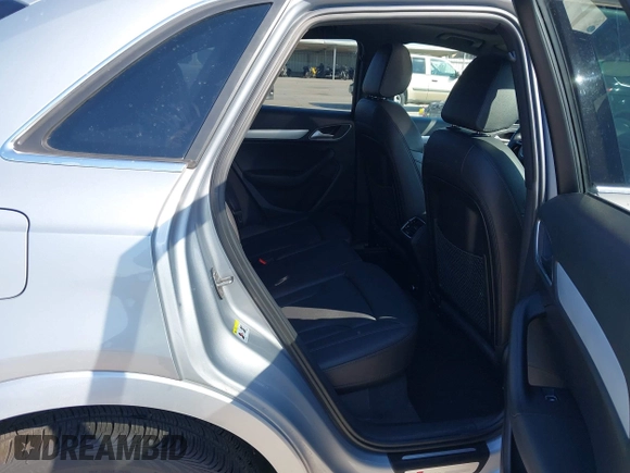 2018 Audi Q3 Premium Plus z VIN WA1JCCFS8JR023281, wystawiony jako IAAI lot #42071289 z przebiegiem 71 335 mil mil oraz . Historia ofert i sprzedaży dostępna na DreamBid. Obrazek 8.