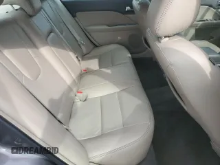 2012 Ford Fusion Hybrid z VIN 3FADP0L33CR211609, wystawiony jako Copart lot #60873005 z przebiegiem 144 474 mil mil oraz Szkoda całkowita • Salvage title. Historia ofert i sprzedaży dostępna na DreamBid. Obrazek 10.