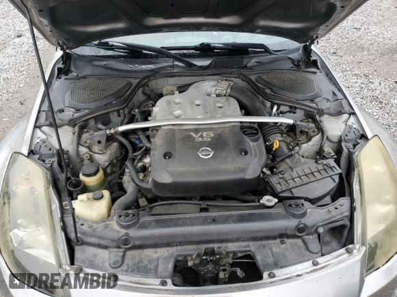 2003 Nissan 350Z Performance z VIN JN1AZ34D33T106988, wystawiony jako Copart lot #57933985 z przebiegiem 203 959 mil mil oraz Szkoda całkowita • Salvage title. Historia ofert i sprzedaży dostępna na DreamBid. Obrazek 11.