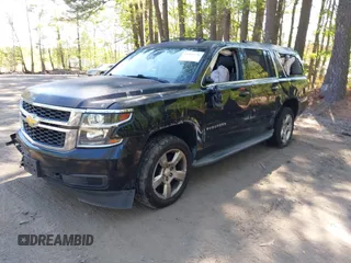 2015 Chevrolet Suburban LT with VIN 1GNSCJKC1FR264255, listed as a IAAI auction lot 42065176 with 115,861 mi miles. Bid and sale history available at carsss.com. Image 17.