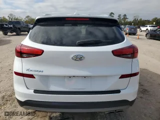 2020 Hyundai Tucson Sport with VIN KM8J33ALXLU093849, listed as a Copart auction lot 82670704 with 87,584 mi miles and Clean Title. Bid and sale history available at carsss.com. Image 6.