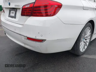 2015 BMW 5 Series 528i with VIN WBA5A5C5XFD516999, listed as a IAAI auction lot 41195184 with 131,187 mi miles. Bid and sale history available at carsss.com. Image 6.