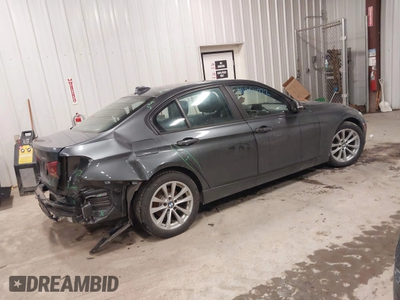 2018 BMW 3 Series 320i xDrive with VIN WBA8E5G50JNU48047, listed as a IAAI auction lot 41564022 with 69,971 mi miles. Bid and sale history available at carsss.com. Image 4.