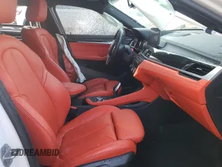 2022 BMW X2 sDrive28i with VIN WBXYH9C05N5T67775, listed as a Copart auction lot 44045505 with 34,100 mi miles and Salvage Title. Bid and sale history available at carsss.com. Image 7.