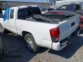 2019 Toyota Tacoma SR with VIN 5TFRX5GN9KX140351, listed as a IAAI auction lot 42593591 with 202,707 mi miles and . Bid and sale history available at DreamBid. Image 3.