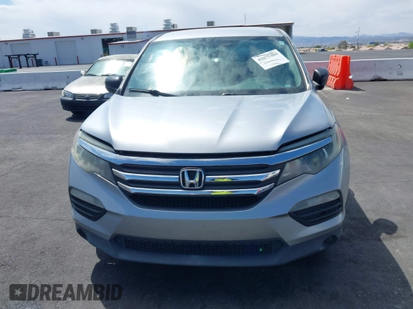 2016 Honda Pilot LX with VIN 5FNYF5H10GB044006, listed as a IAAI auction lot 42075404 with 129,642 mi miles and . Bid and sale history available at DreamBid. Image 6.