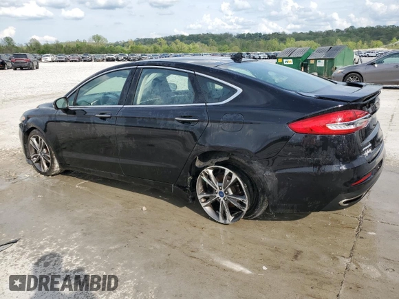 2020 Ford Fusion Titanium with VIN 3FA6P0D90LR192500, listed as a Copart auction lot 53746345 with 135,636 mi miles and Salvage title. Bid and sale history available at DreamBid. Image 2.