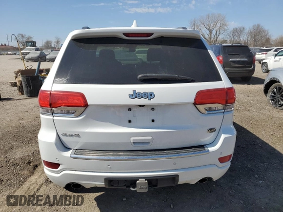 2014 Jeep Grand Cherokee Overland with VIN 1C4RJFCT7EC105296, listed as a Copart auction lot 50822775 with 180,067 mi miles and Salvage Title. Bid and sale history available at DreamBid. Image 6.
