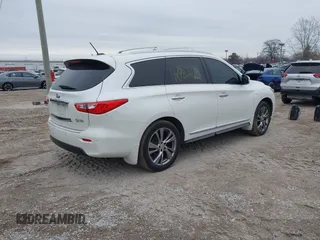 2015 Infiniti QX60 with VIN 5N1AL0MM5FC526488, listed as a IAAI auction lot 41511123 with 118,220 mi miles and . Bid and sale history available at DreamBid. Image 4.
