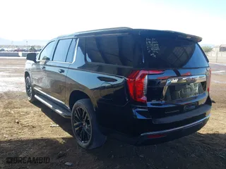 2024 GMC Yukon XL SLT with VIN 1GKS2GKD2RR157523, listed as a IAAI auction lot 41600219 with 52,444 mi miles. Bid and sale history available at carsss.com. Image 3.