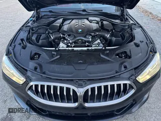 2020 BMW 8 Series M850i with VIN WBAGV8C08LBP48642, listed as a IAAI auction lot 41346377 with 141,651 mi miles. Bid and sale history available at carsss.com. Image 10.