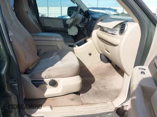 2004 Ford Expedition Special Service z VIN 1FMRU15W04LB54416, wystawiony jako IAAI lot #41392133 z przebiegiem 239 534 mil mil oraz . Historia ofert i sprzedaży dostępna na DreamBid. Obrazek 5.