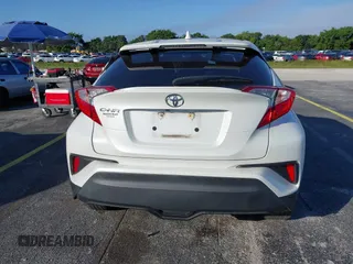 2021 Toyota C-HR LE with VIN NMTKHMBX0MR123981, listed as a IAAI auction lot 41273382 with 51,988 mi miles. Bid and sale history available at carsss.com. Image 16.