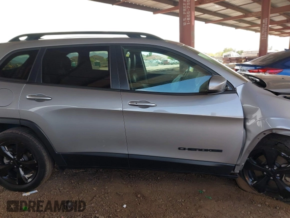 2021 Jeep Cherokee Altitude z VIN 1C4PJLLB2MD237081, wystawiony jako IAAI lot #41965687 z przebiegiem 76 701 mil mil oraz . Historia ofert i sprzedaży dostępna na DreamBid. Obrazek 13.