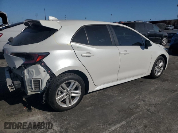 2021 Toyota Corolla Hatchback SE with VIN JTND4MBE0M3130088, listed as a Copart auction lot 71381584 with 37,279 mi miles and Salvage Title. Bid and sale history available at carsss.com. Image 3.