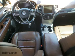 2015 Jeep Grand Cherokee Summit with VIN 1C4RJFJM3FC731831, listed as a Copart auction lot 66570534 with 230,193 mi miles and Clean Title. Bid and sale history available at carsss.com. Image 8.