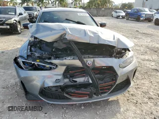 2023 BMW M3 with VIN WBS53AY03PFN77824, listed as a Copart auction lot 86100404 with 30,311 mi miles and Salvage Title. Bid and sale history available at carsss.com. Image 5.