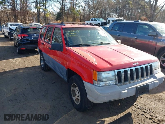 1997 Jeep Grand Cherokee Laredo with VIN 1J4GZ58S0VC550242, listed as a IAAI auction lot 41032114 with 185,307 mi miles. Bid and sale history available at carsss.com. Image 1.